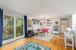 Open concept space with access to the back deck